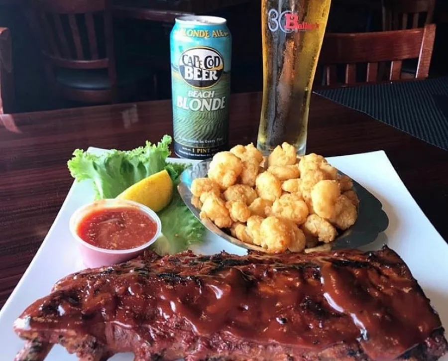 Charbroiled baby back ribs, fried shrimp and Cape Cod beer at Bailey's