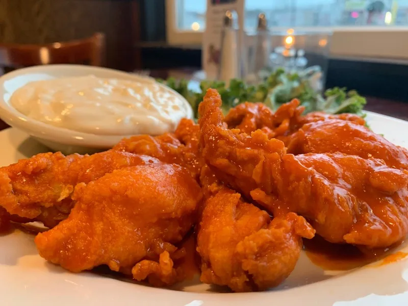 Boneless buffalo wings with blue cheese dressing