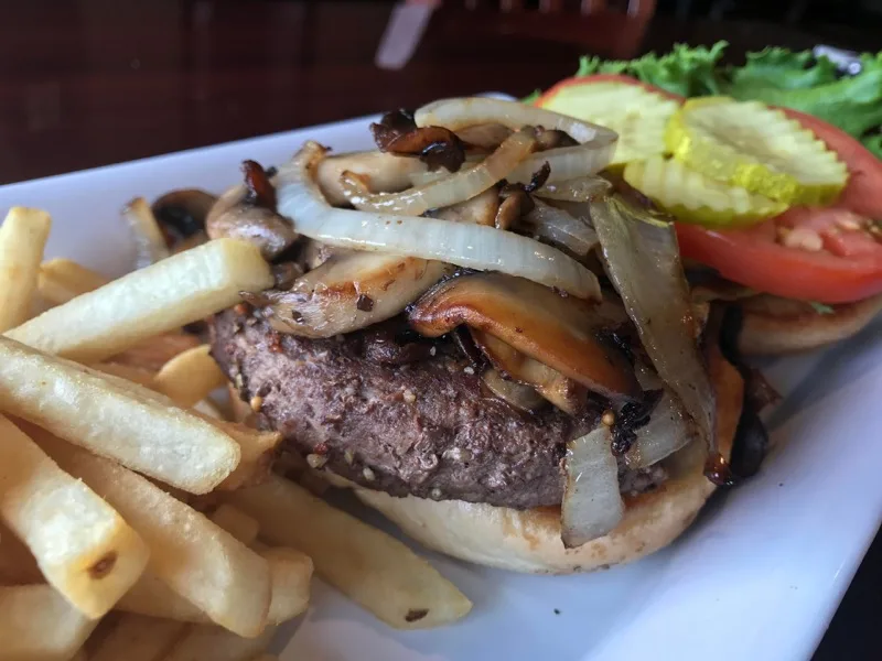 Alpine burger with sauteed mushrooms and onions